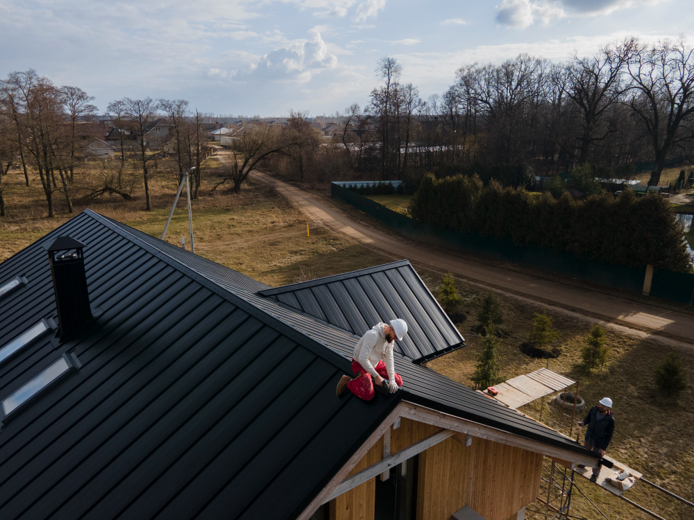 long-shot-roofer-working-with-helmet.jpg